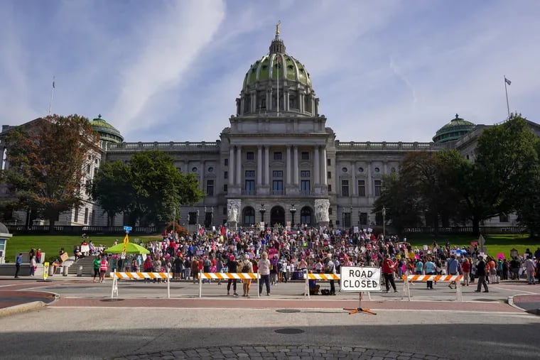 People gather outside the Pennsylvania State Capitol Building for the Bans Off Our Bodies rally in Harrisburg in October.