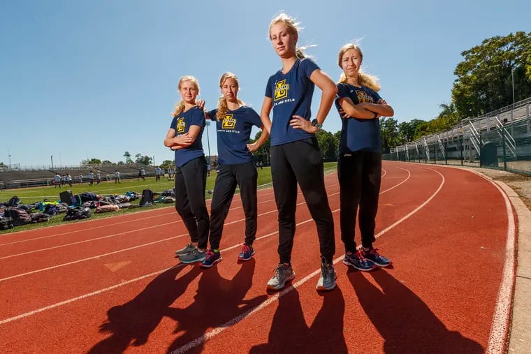The four Mancini sisters have always run together, and now are doing it at La Salle. They are (from left) freshman Christine, sophomore Liz, senior Grace, and sophomore El.