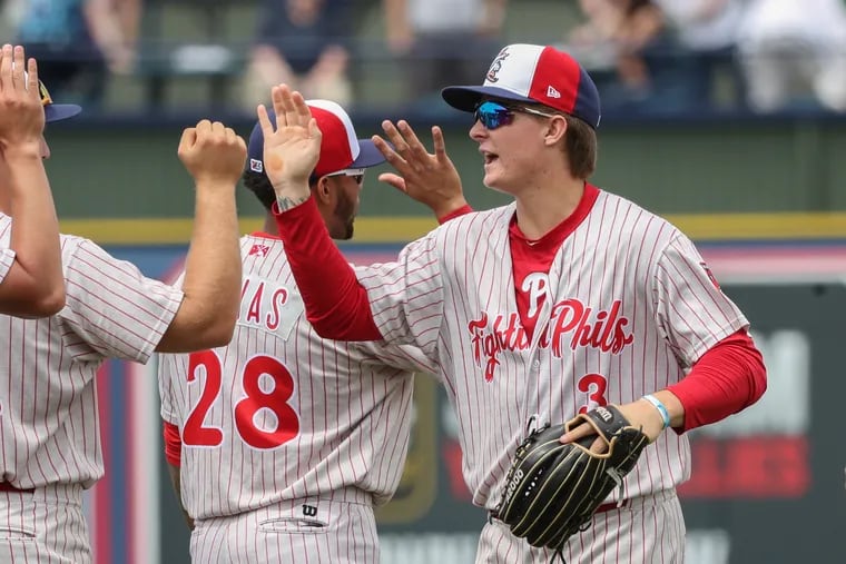 Reading Fightin Phils' center fielder Mickey Moniak (right) isn't at the top of the game right now, but he's known the spotlight since he was in high school.
