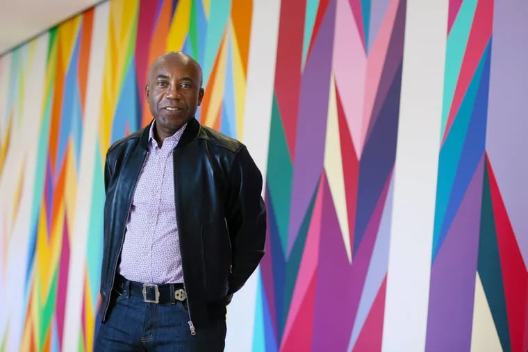 Painter Odili Donald Odita with his commission "Walls of Change," at the Philadelphia Museum of Art. The work is part of the upcoming exhibit "New Grit: Art & Philly Now," which opens May 7 in the museum's new Daniel W. Dietrich II Galleries.
