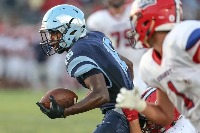 North Penn's Evan Spann on his 11 yard TD run against  Neshaminy during the 1st quarter in Lansdale, Friday,  August 23, 2019.