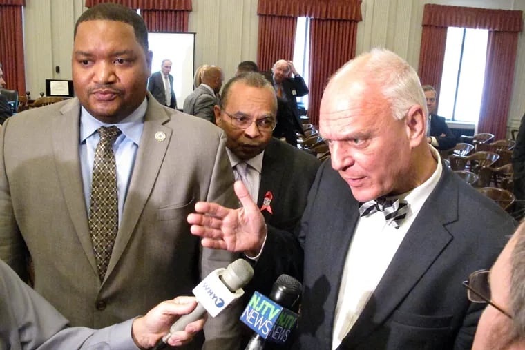 Atlantic City Councilmen Marty Small (from left) and William Marsh and Mayor Don Guardian speak to reporters after a state Assembly hearing in Trenton N.J., on Wednesday, Oct. 26, 2016.