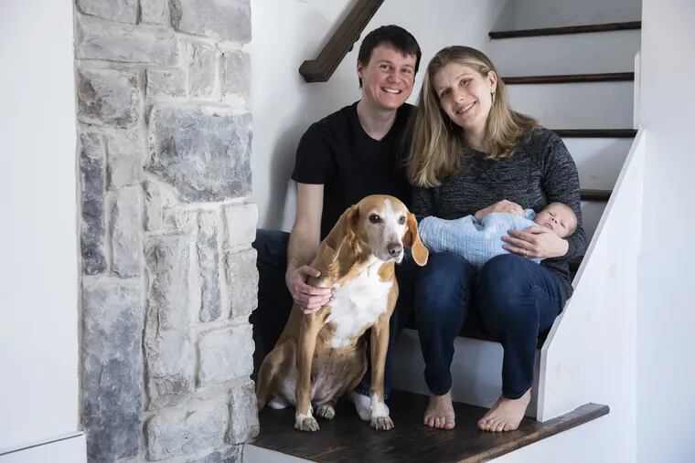 Kenny and Debby with son Kellen. The dog is Katie.