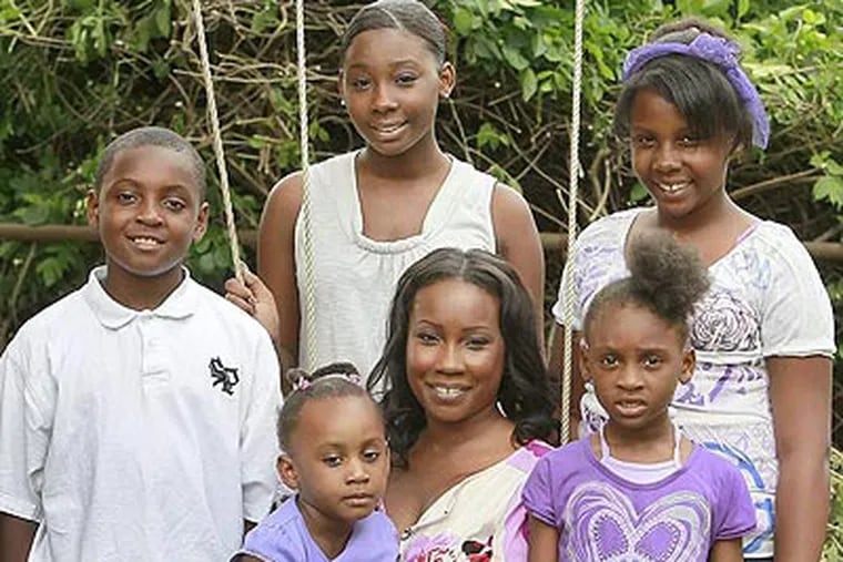 Nefertari Nelson-Williams and her children (from Left) Shawn JR.10; Octavia,19; Shayba,4; Nefertari,38; Shawna,7 and Olivia,12 are posing for photo at her Willingboro home.( AKIRA SUWA / Staff Photographer )