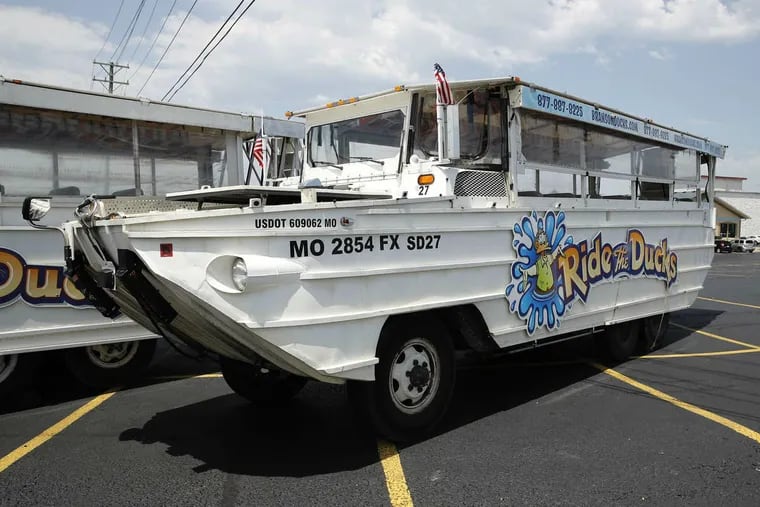 In this July 20, 2018, file photo, a duck boat sits idle in a parking lot in Branson, Mo.