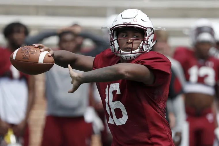 Temple quarterback Todd Centeio throwing during a scrimmage in August.