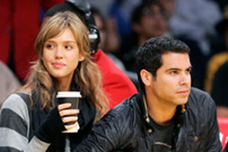 Soon to be a fantastic three: Actress Jessica Alba with Cash Warren at the Warriors-Lakers game Sunday. (See &quot;Alba&#0039;s dearest creation.&quot;)