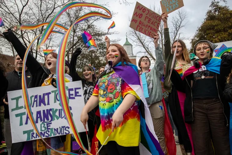 Students protest the Central Bucks School District last month in the wake of a school board vote banning Pride flags and other "advocacy" materials from classrooms.