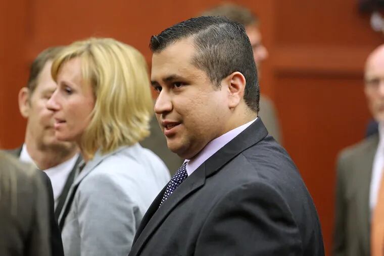 George Zimmerman leaves the courtroom a free man after being found not guilty on July 13, 2013.