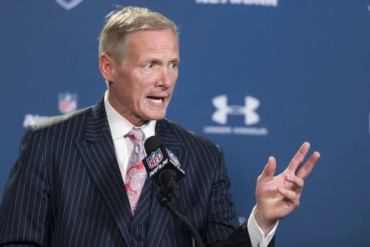 NFL Network draft analyst Mike Mayock talks with reporters during a news conference at the NFL football scouting combine in Indianapolis on Feb. 21, 2015.