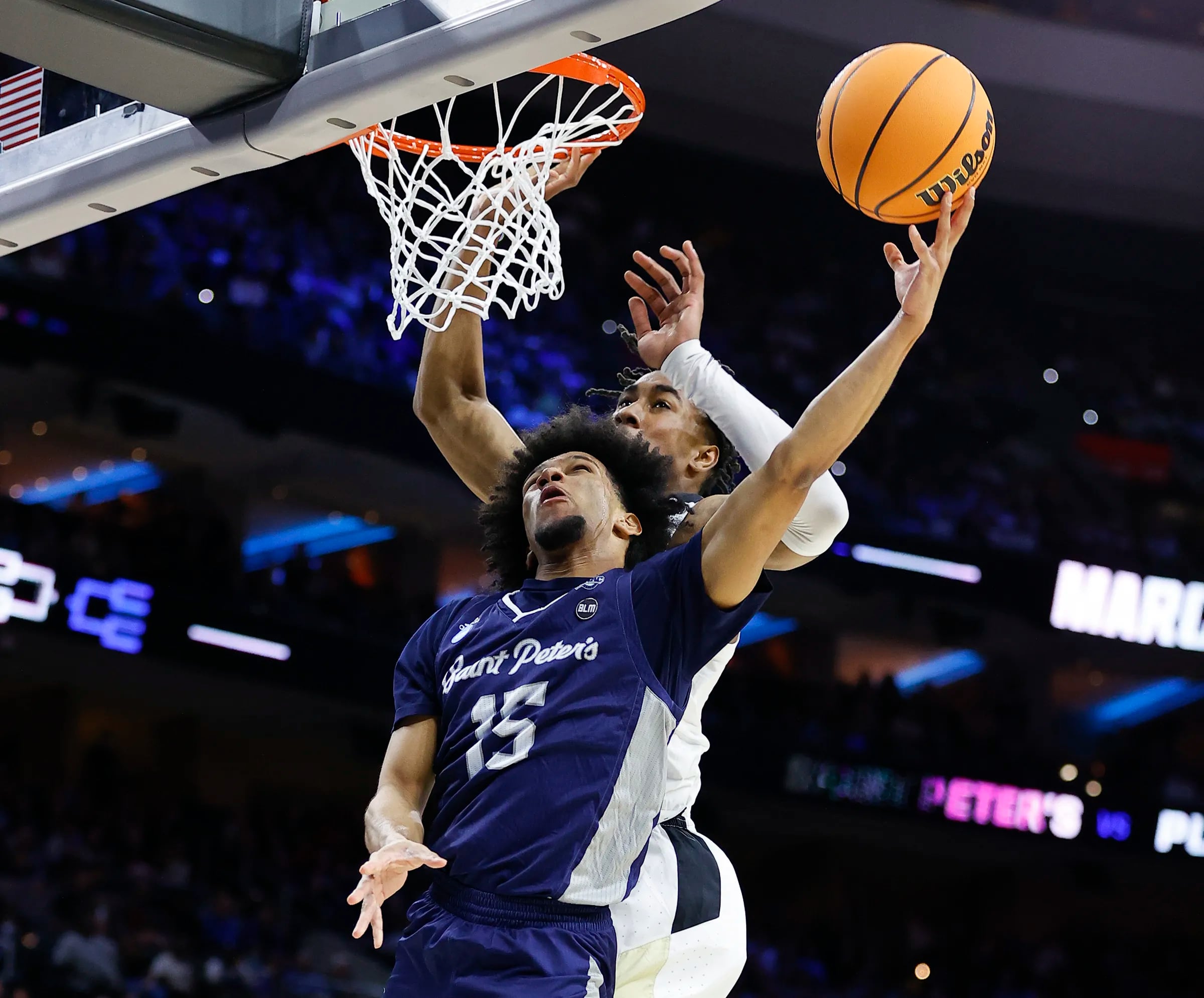 Photos of Saint Peter's advancing to the Elite Eight