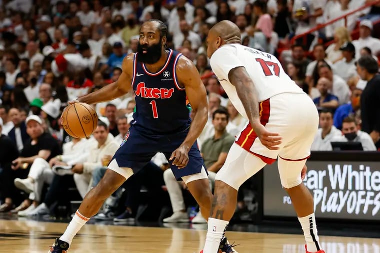 James Harden is defended by Miami Heat forward P.J. Tucker, who could soon become a member of the Sixers.