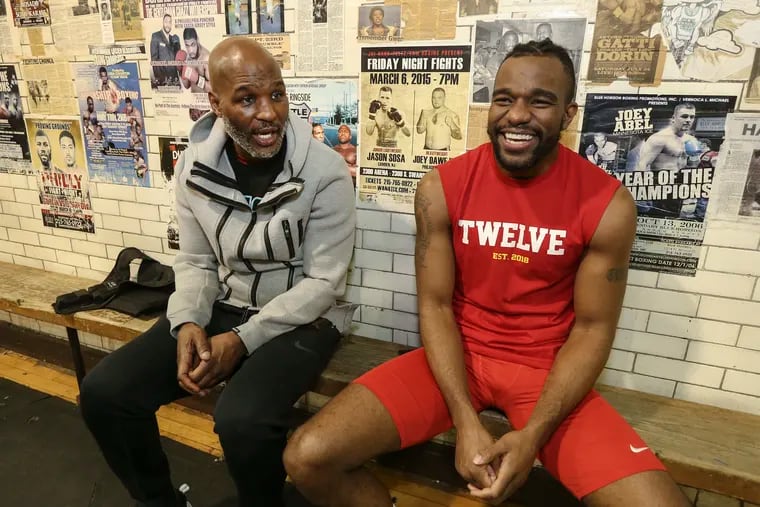 Boxing legend Benard Hopkins (left) inspired fellow Philadelphia boxer Jesse Hart after the two met at an Upper Darby gym.