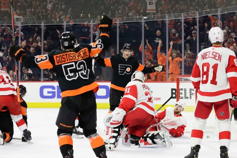 Flyers defenseman Shayne Gostisbehere celebrates his first-period goal in Friday's 6-1 win over Detroit at the Wells Fargo Center.