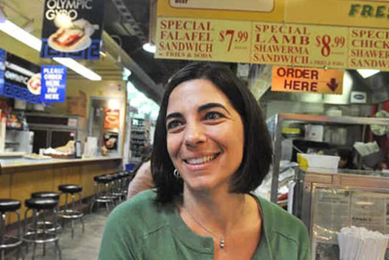 Dee Spagnuolo, 34, of Philadelphia, gives her opinion about the city of Philadelphia while at the Reading Terminal. (Sharon Gekoski-Kimmel / Staff Photographer)