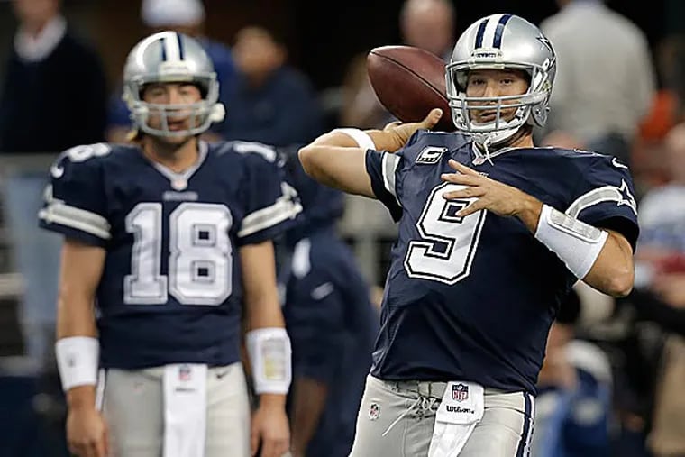 Cowboys quarterbacks Kyle Orton and Tony Romo. (Brandon Wade/AP)