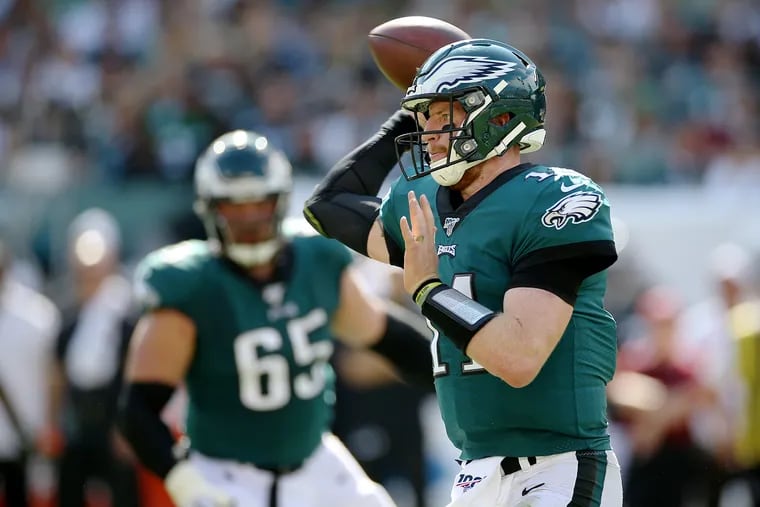 Eagles quarterback Carson Wentz throws a pass against the Washington Redskins on Sunday.
