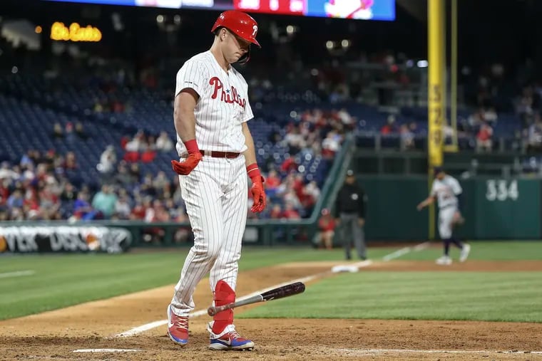 Phillies' Rhys Hoskins throws the bat after striking out against the Tigers for the third out during the 8th inning at Citizens Bank Park in Philadelphia, Tuesday, April 30, 2019   Tigers beat the Phillies 3-1.