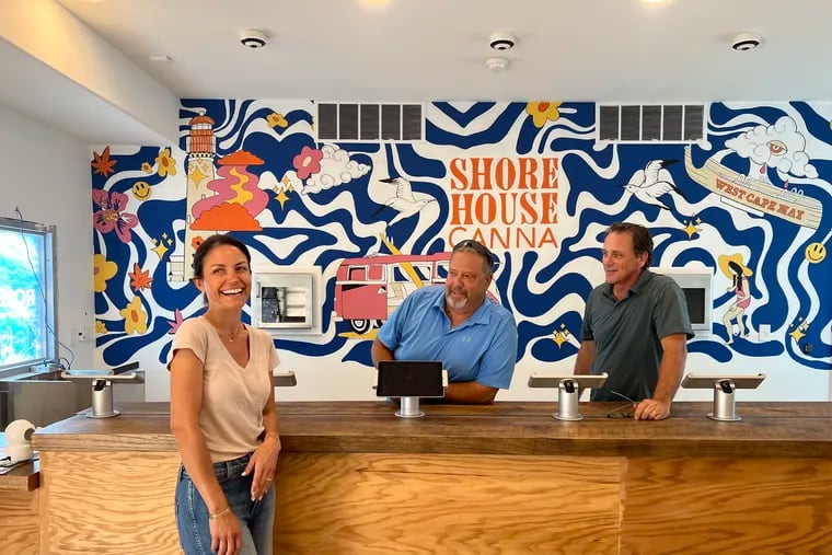 Nicole Melchiorre (left), Tomas Nuscis (center), and Dave Christian (right) at their legal marijuana dispensary, Shore House Canna LLC, in West Cape May, New Jersey.