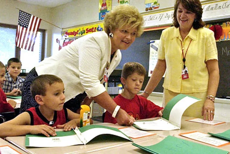 Myra Forrest (center) was fired as superintendent on June 22. (Staff File Photo)