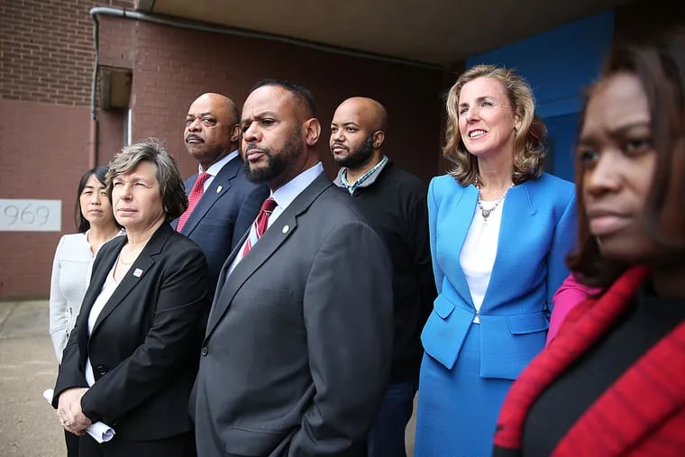 Randi Weingarten (second from left), president of the American Federation of Teachers, and Katie McGinty (second from right), candidate in the Democratic primary for the U.S. Senate, were among those who toured E.W. Rhodes Elementary School in North Philadelphia.