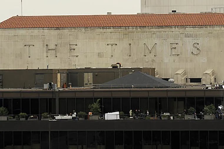 The Tribune Company's decision to file for bankruptcy could be a crushing blow to the newspapers it owns, including the <i>Los Angeles Times</i>. (Kevork Djansezian/AP)