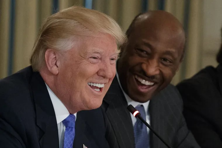 Merck CEO Kenneth Frazier, right, watches as President Donald Trump speaks during a meeting with manufacturing executives at the White House in Washington, Thursday, Feb. 23, 2017. Frazier later broke with the president over the white supremecist rally in Charlottesville, Va.