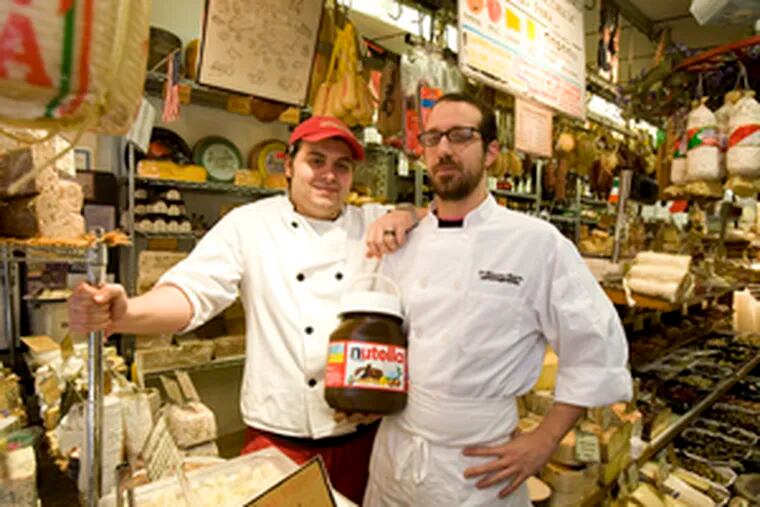 Di Bruno&#0039;s Hunter Fike (left) and Angelo Colavita have each sold one over-the-top tub of Nutella, a creamy hazelnut-and-cocoa confection. &quot;We didn&#0039;t know if anyone would want to buy one. It&#0039;s pretty obscene,&quot; Colavita said. &quot;But it became a challenge.&quot;