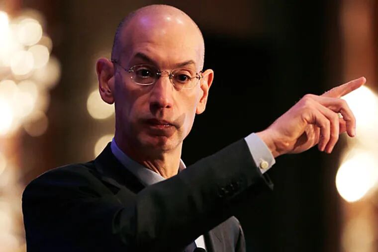 NBA Commissioner Adam Silver gestures during an address, Wednesday, March 12, 2014, in Boston. (Charles Krupa/AP)