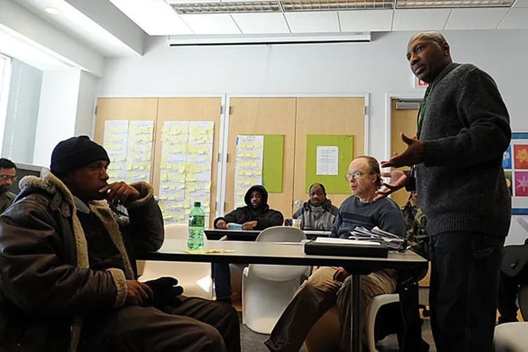 Rodney Hallman instructs clients during a class of the Next Step Program of the Green Door, Jan. 24, 2104 in Washington, D.C. The Green Door is a community mental health organization that provides counseling and services mainly for Medicaid patients. (Astrid Riecken/MCT)