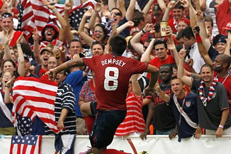 Clint Dempsey celebrates after scoring against Jamaica in the United States' victory. (Alex Brandon/AP Photo)