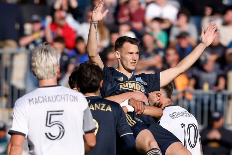 Union’s Daniel Gazdag is held up by teammates after he scored against Toronto on Oct. 9.