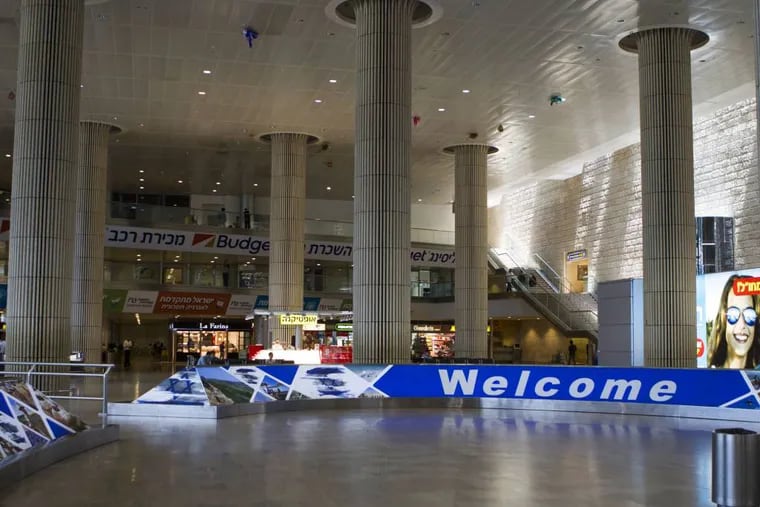 The arrivals terminal is empty at Ben Gurion International airport a day after the U.S. Federal Aviation Administration imposed a 24-hour restriction on flights after a Hamas rocket landed Tuesday within a mile of the airport, in Tel Aviv, Israel, Wednesday, July 23, 2014. U.S. Secretary of State John Kerry flew into Israel's main airport Wednesday despite a Federal Aviation Administration ban in an apparent sign of his determination to achieve a cease-fire agreement in the warring Gaza Strip despite little evidence of progress in ongoing negotiations. (AP Photo/Dan Balilty)