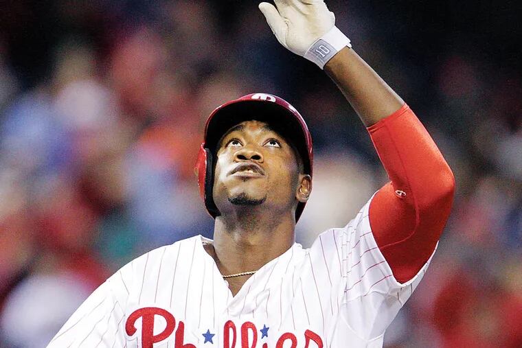 Phillies' left fielder Domonic Brown (9) looks up to the sky as he crosses home plate after hitting a solo homer against the Marlins during the 4th inning at Citizens Bank Park in Philadelphia, Friday, May 3, 2013.  (  Steven M. Falk / Staff Photographer )