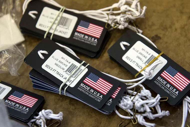 Labels for American Giant sweatshirts tout domestic production. (David Paul Morris / Bloomberg)