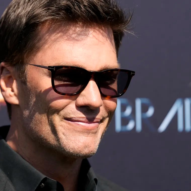 Tom Brady poses on the red carpet before "The Greatest Roast of All Time: Tom Brady" at the Kia Forum on Sunday.