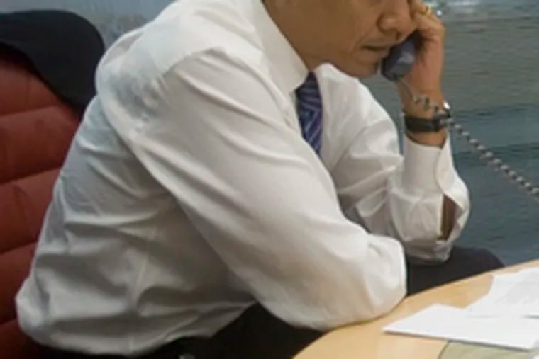 President-elect Obama talking on the telephone to Israeli Prime Minister Ehud Olmert on Thursday.