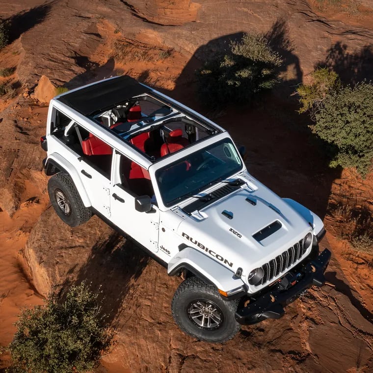 The 2024 Jeep Wrangler Rubicon 392 features a sliding power top, which is much more convenient than most versions of the soft top.