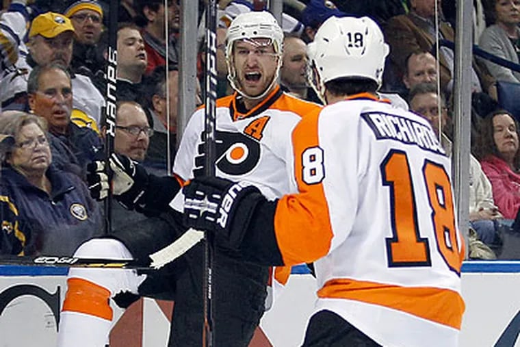 Jeff Carter celebrates after scoring the first goal in the Flyers' 4-2 win over the Sabres. (Yong Kim/Staff Photographer)