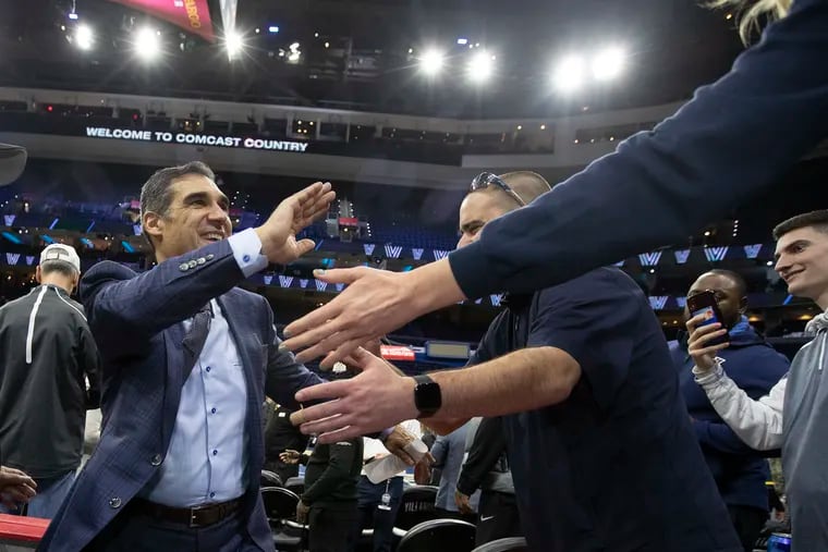 Jay Wright shakes hands with fans after Villanova's win over Georgetown at the Wells Fargo Center in January.