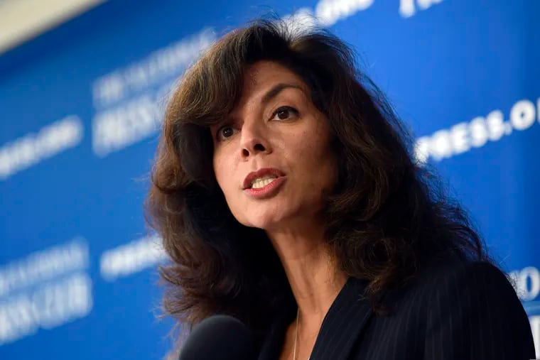 Ashley Tabaddor, a federal immigration judge in Los Angeles and president of the National Association of Immigration Judges, speaks in 2018 at the National Press Club in Washington. Tabaddor said the Trump administration’s pilot program to hold video court hearings for migrant teens, instead of having them appear before a judge in person, has been riddled with glitches.