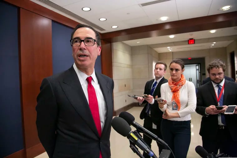 Treasury Secretary Steven Mnuchin speaks to reporters after giving a classified briefing to members of the House of Representatives, telling them that the Trump administration will keep strict U.S. sanctions on the Russian oligarch Oleg Deripaska.