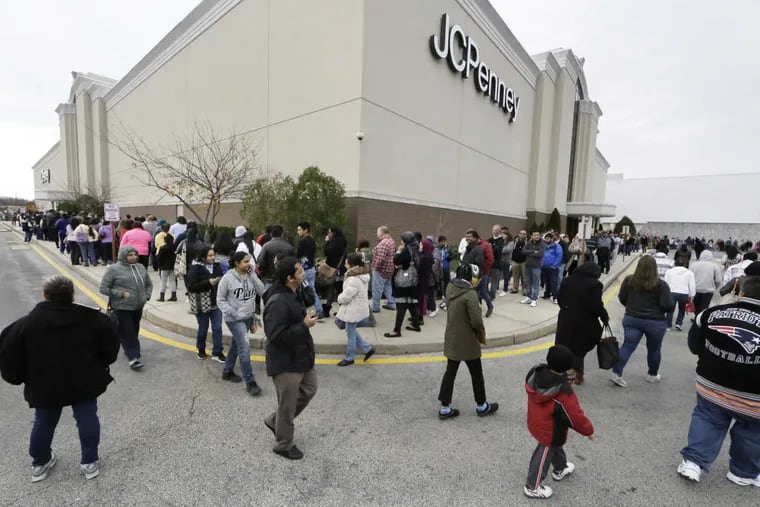 Early Black Friday shoppers at JCPenney in Deptford look for the end of the line. The store opened at 3 p.m. on Thanksgiving.