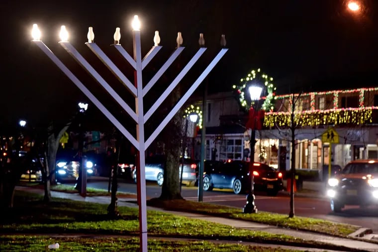 A community menorah illuminates the night skies in downtown Haddonfield.