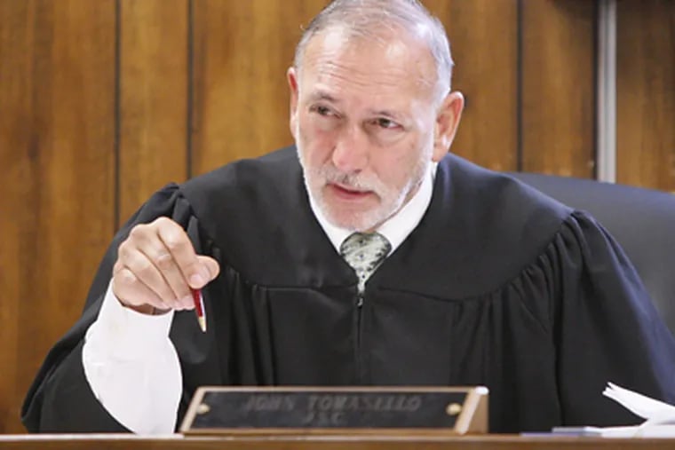 Judge John Tomasello asks a question during the trial over who gets Dexter the dog at the Salem County Courthouse on July 29. (Elizabeth Robertson / Staff Photographer)