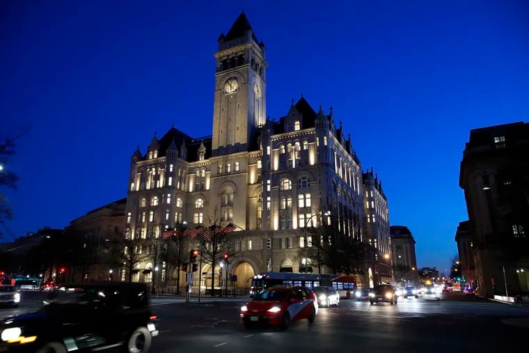 FILE - This Jan. 30, 2018, file photo shows the Trump International Hotel in Washington. A federal appeals court is set to hear arguments in a lawsuit that claims President Donald Trump is violating the Constitution by accepting profits from foreign and domestic officials through his hotel in Washington. (AP Photo/Alex Brandon, File)