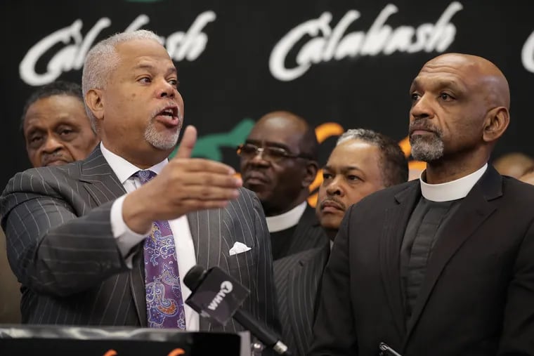 The Black Clergy of Philadelphia and Vicinity announces its endorsement of State Sen. Anthony Williams, left, for mayor of Philadelphia during a news conference at Calabash Restaurant in Philadelphia, PA on May 7, 2019. Williams speaks as Rev. Jay Broadnax, right, president of the Black Clergy of Philadelphia and Vicinity, listens along with members of their cabinet.