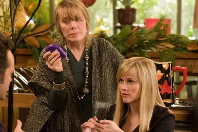 Family fissures open as Brad and girlfriend Kate (Vince Vaughn, Reese Witherspoon) play a board game with Brad&#0039;s mother (Sissy Spacek).