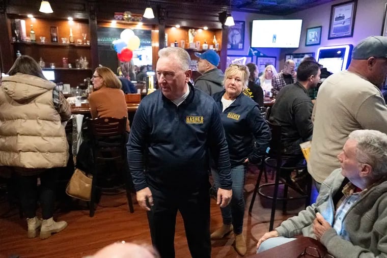 Republican at-large City Council candidate Jim Hasher greets supporters at his election night party at Jimmy’s Timeout Sports Pub, which he owns, in Northeast Philadelphia. He and his running mate Drew Murray lost to a pair of Working Families Party candidates.