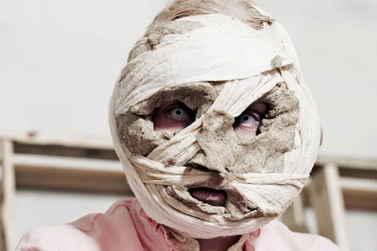 Gabriela Fridriksdottir, the Icelandic artist, in a self-portrait with her head wrapped in gauze and bread dough, from her 2006 project, "Inside the Core," at Moore College of Art & Design.